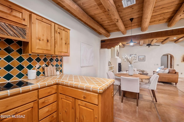 3008 E Placita Santa Lucia, Tucson, AZ 85716 - kitchen featuring tile countertops, decorative backsplash, a wood ceiling with exposed beams, open floor plan, and a peninsula