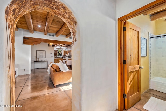 3008 E Placita Santa Lucia, Tucson, AZ 85716 - corridor featuring a wooden ceiling with exposed beams, arched walkways, and concrete flooring