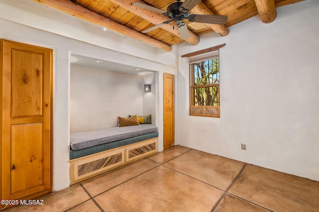 3008 E Placita Santa Lucia, Tucson, AZ 85716 - bedroom featuring a wood ceiling with exposed beams and concrete flooring