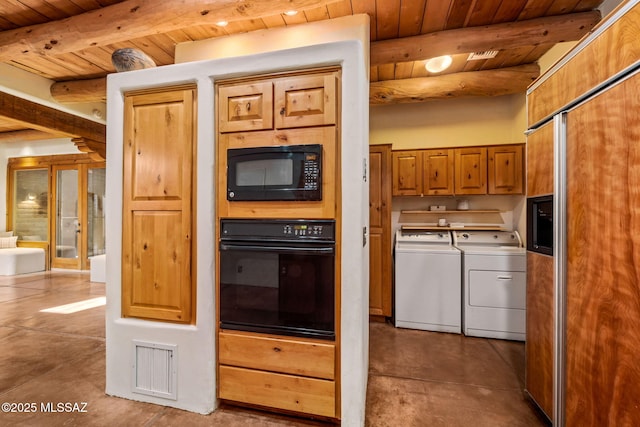 3008 E Placita Santa Lucia, Tucson, AZ 85716 - kitchen featuring black appliances, separate washer and dryer, a wooden ceiling with exposed beams, concrete flooring, and brown cabinetry