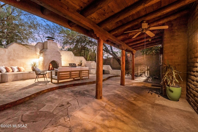 3008 E Placita Santa Lucia, Tucson, AZ 85716 - view of patio / terrace featuring an outdoor living space with a fireplace and a ceiling fan
