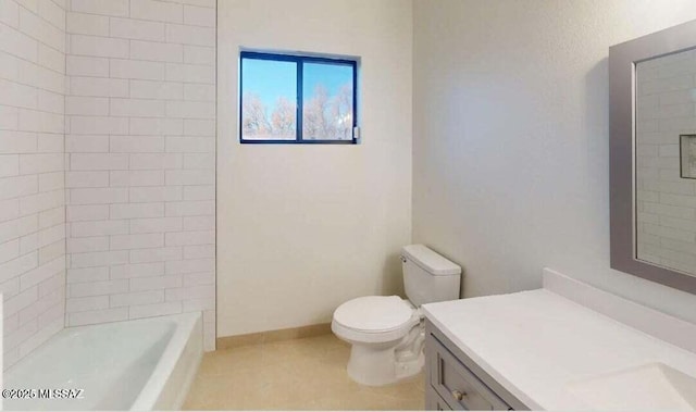 bathroom with vanity, toilet, and tile patterned floors