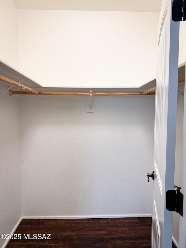 3700 S Serena Ln, Tucson, AZ 85730 - walk in closet featuring wood finished floors