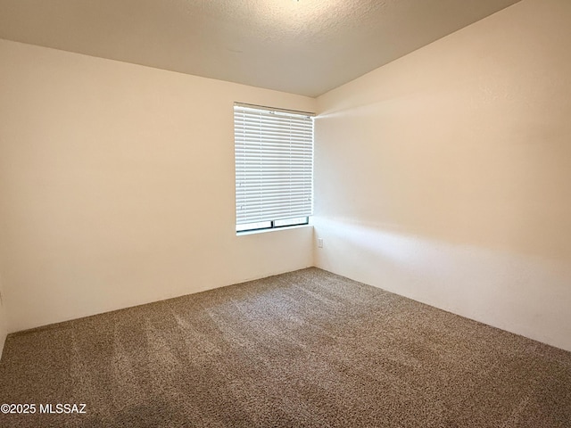 3700 S Serena Ln, Tucson, AZ 85730 - carpeted empty room featuring vaulted ceiling