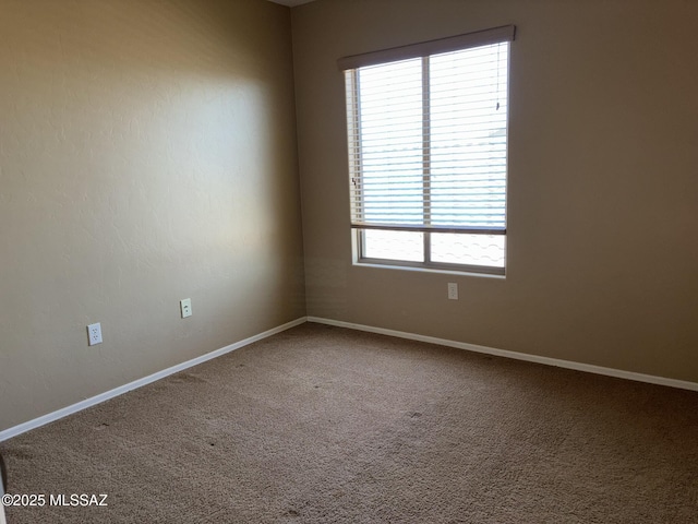 262 W Calle Paso Suave, Sahuarita, AZ 85629 - empty room with carpet floors and baseboards