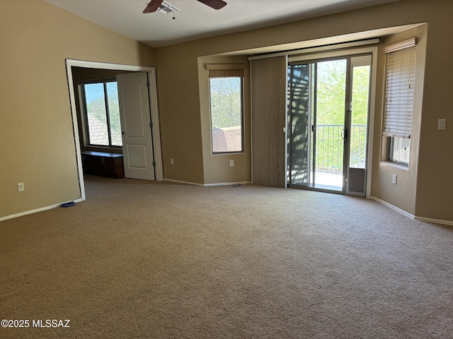 262 W Calle Paso Suave, Sahuarita, AZ 85629 - empty room with a ceiling fan, healthy amount of natural light, baseboards, and lofted ceiling