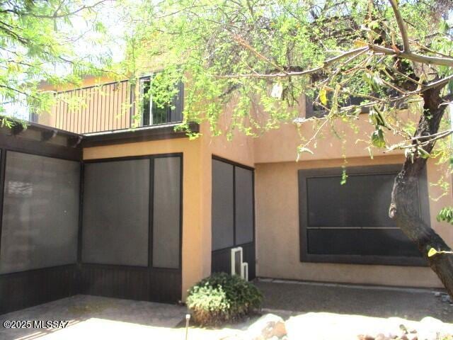 262 W Calle Paso Suave, Sahuarita, AZ 85629 - exterior space featuring stucco siding