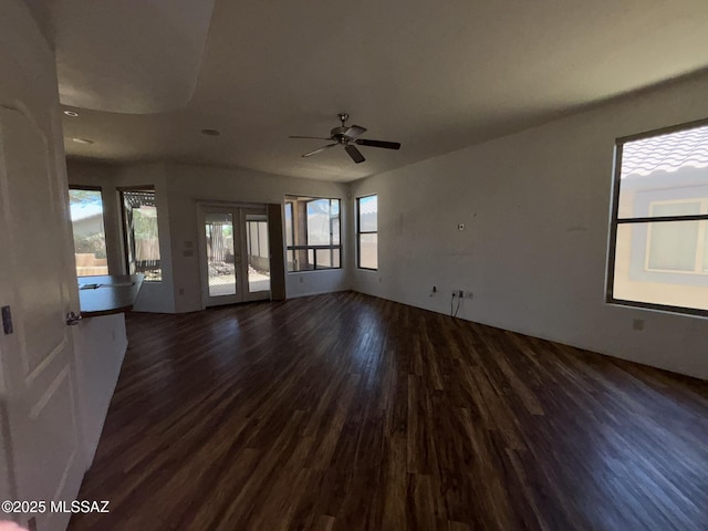 262 W Calle Paso Suave, Sahuarita, AZ 85629 - unfurnished living room with dark wood-style flooring, ceiling fan, and recessed lighting
