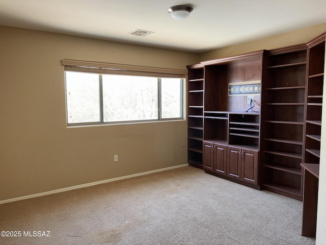262 W Calle Paso Suave, Sahuarita, AZ 85629 - unfurnished living room featuring light colored carpet and baseboards