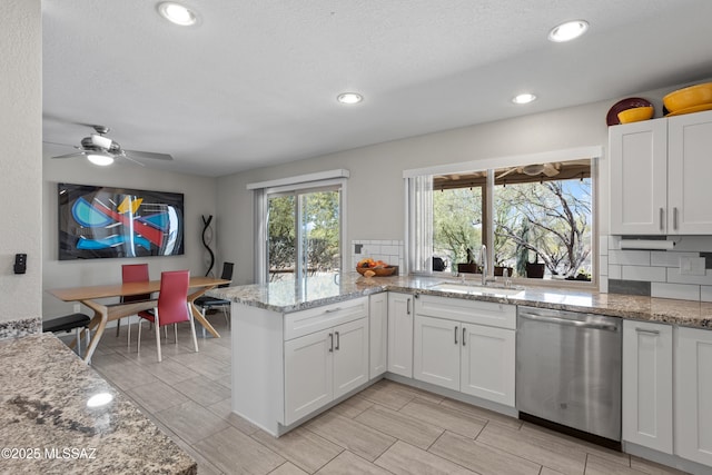2282 W Rapallo Way, Tucson, AZ 85741 - kitchen featuring dishwasher, a sink, tasteful backsplash, a peninsula, and recessed lighting