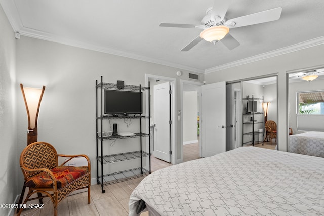 2282 W Rapallo Way, Tucson, AZ 85741 - bedroom with light wood-style flooring, crown molding, baseboards, and a ceiling fan