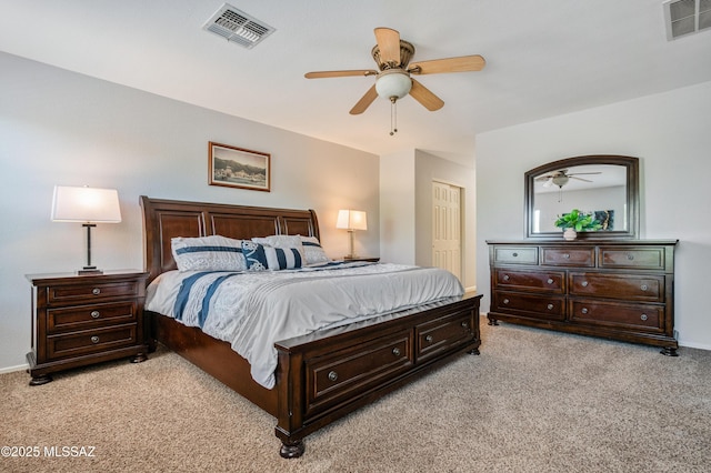 14570 S Sumac Dr, Sahuarita, AZ 85629 - bedroom featuring light colored carpet, a ceiling fan, baseboards, and a closet