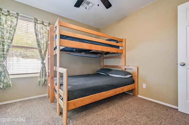 14570 S Sumac Dr, Sahuarita, AZ 85629 - carpeted bedroom with multiple windows, ceiling fan, and baseboards