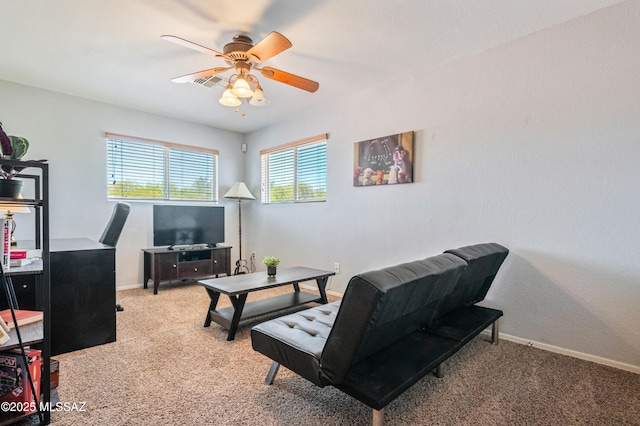 14570 S Sumac Dr, Sahuarita, AZ 85629 - sitting room with carpet floors, a ceiling fan, a desk, and baseboards