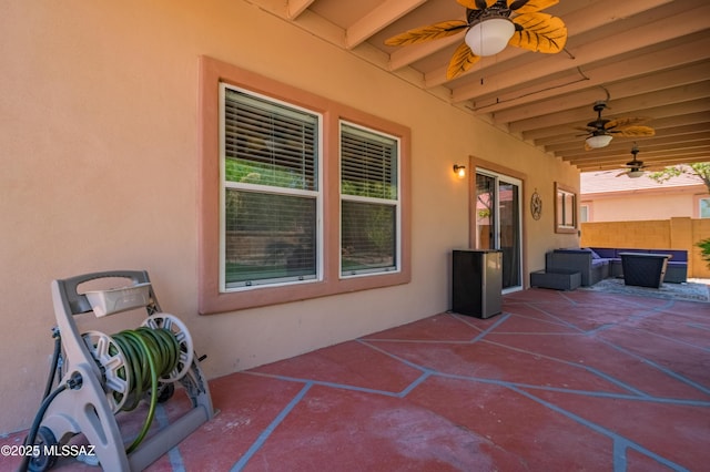 14570 S Sumac Dr, Sahuarita, AZ 85629 - view of patio featuring a ceiling fan, outdoor lounge area, and fence
