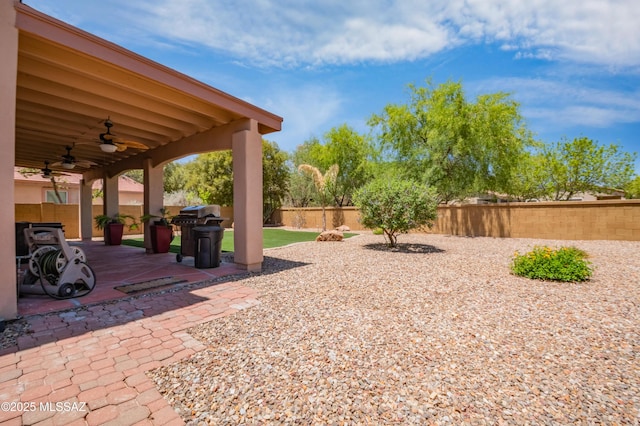 14570 S Sumac Dr, Sahuarita, AZ 85629 - fenced backyard featuring a ceiling fan and a patio