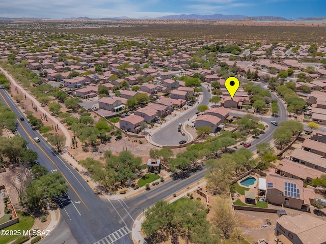 14570 S Sumac Dr, Sahuarita, AZ 85629 - aerial overview of property's location with a mountain backdrop and nearby suburban area