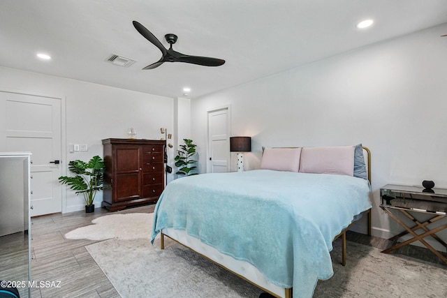 3454 E Calle Del Prado, Tucson, AZ 85716 - bedroom featuring recessed lighting, baseboards, a ceiling fan, and wood finished floors