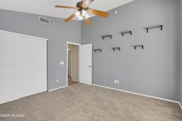 14024 E Fairway Bluff Ct, Vail, AZ 85641 - unfurnished bedroom with carpet, baseboards, a closet, and a ceiling fan