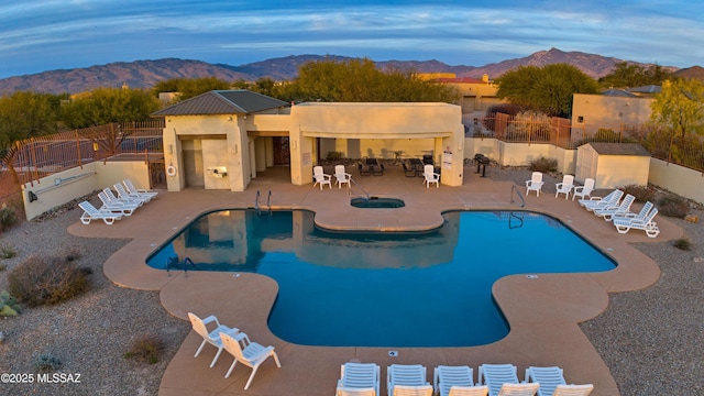 14024 E Fairway Bluff Ct, Vail, AZ 85641 - community pool featuring a mountain view, fence, and a patio