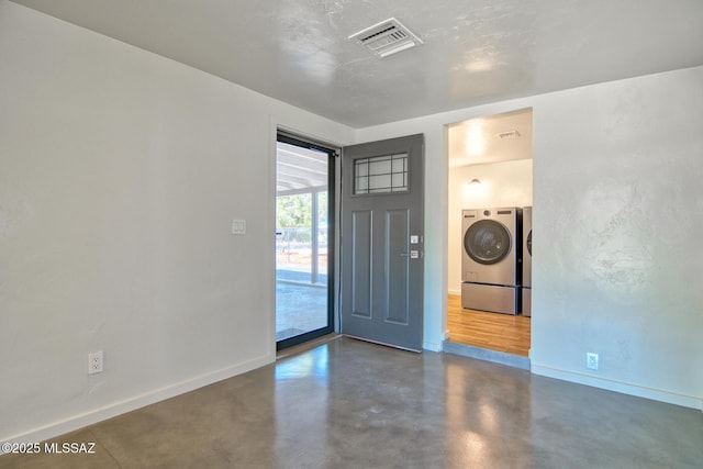 3341 E 23rd St, Tucson, AZ 85713 - foyer with baseboards and finished concrete floors