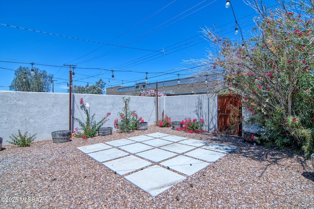3341 E 23rd St, Tucson, AZ 85713 - fenced backyard featuring a patio