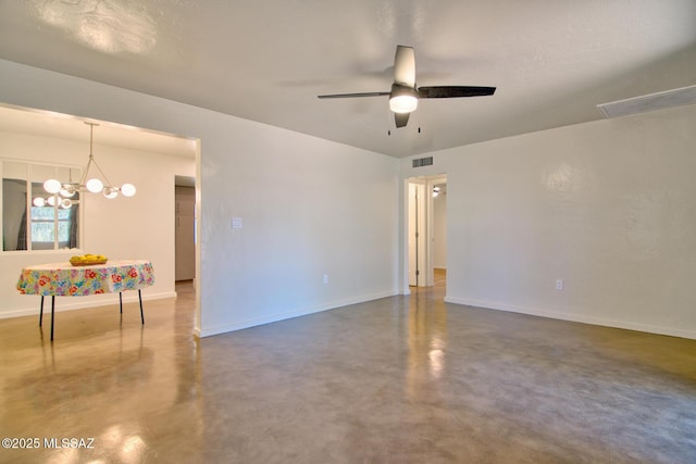 3341 E 23rd St, Tucson, AZ 85713 - spare room with finished concrete flooring, ceiling fan, baseboards, and a chandelier