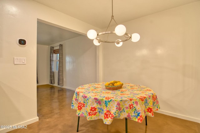 3341 E 23rd St, Tucson, AZ 85713 - dining area with a chandelier and baseboards