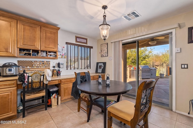 14234 E Placita Niebla, Tucson, AZ 85747 - dining space with light tile patterned floors