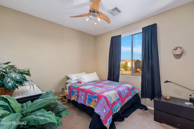 14234 E Placita Niebla, Tucson, AZ 85747 - carpeted bedroom featuring baseboards and ceiling fan