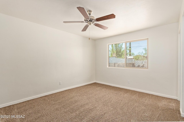 1540 N Calle Valencia, Oracle, AZ 85623 - empty room with carpet, ceiling fan, and baseboards