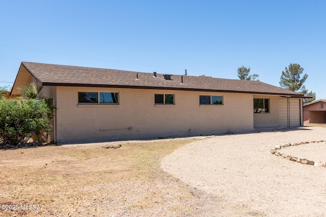 1540 N Calle Valencia, Oracle, AZ 85623 - rear view of property with brick siding and roof with shingles