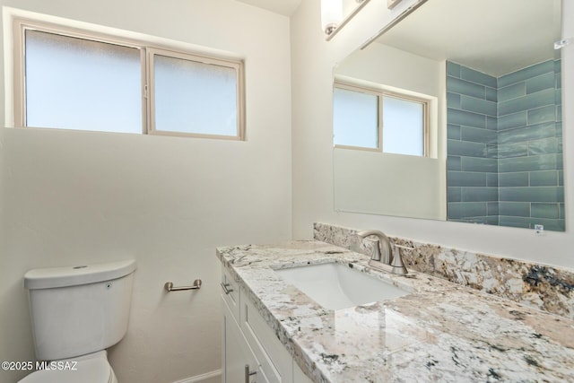 1540 N Calle Valencia, Oracle, AZ 85623 - bathroom featuring toilet, vanity, and baseboards