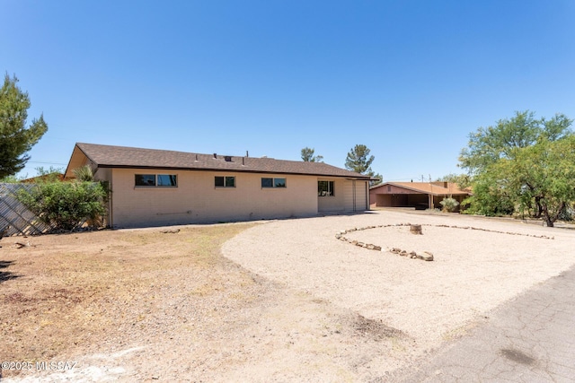 1540 N Calle Valencia, Oracle, AZ 85623 - rear view of house with fence and brick siding