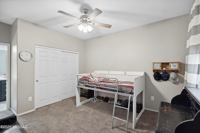 9693 N Melandra Way, Marana, AZ 85653 - carpeted bedroom featuring a closet, a ceiling fan, and baseboards