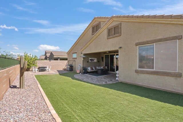 9693 N Melandra Way, Marana, AZ 85653 - view of yard with a patio area and an outdoor living space