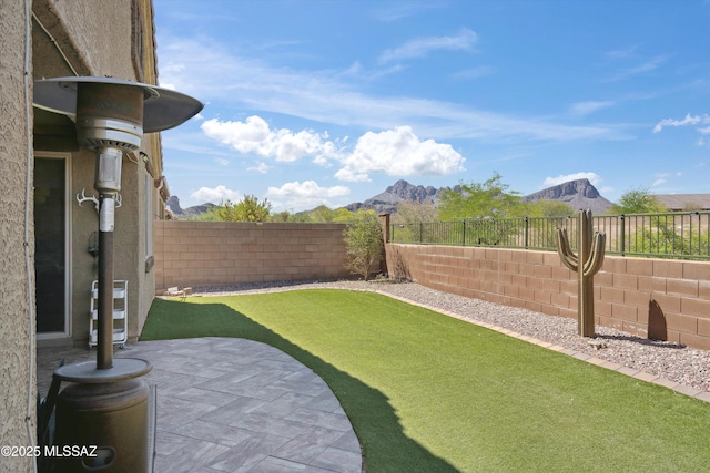 9693 N Melandra Way, Marana, AZ 85653 - fenced backyard with a mountain view and a patio