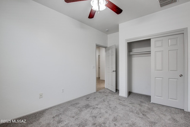 6837 W Leeward Cove Way, Tucson, AZ 85757 - unfurnished bedroom featuring carpet floors, a closet, and ceiling fan