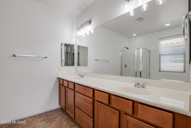 6837 W Leeward Cove Way, Tucson, AZ 85757 - full bath featuring a stall shower, double vanity, tile patterned floors, and baseboards