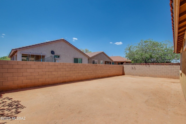 6837 W Leeward Cove Way, Tucson, AZ 85757 - fenced backyard with a patio