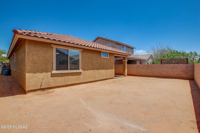 6837 W Leeward Cove Way, Tucson, AZ 85757 - back of house with a patio area, a fenced backyard, and stucco siding