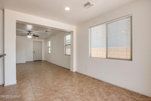 6837 W Leeward Cove Way, Tucson, AZ 85757 - empty room featuring ceiling fan, recessed lighting, and light tile patterned floors