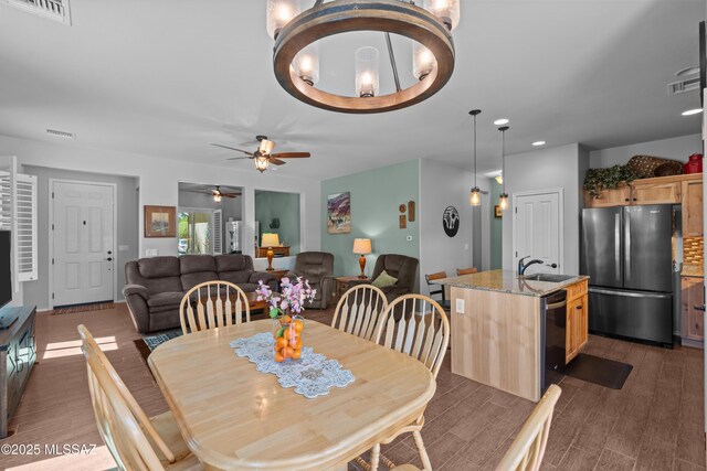 2108 W Moon Milk St, Benson, AZ 85602 - dining room featuring ceiling fan, wood finished floors, and recessed lighting