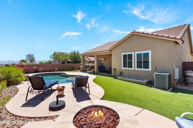 2108 W Moon Milk St, Benson, AZ 85602 - view of swimming pool featuring an outdoor fire pit, a patio, and central AC