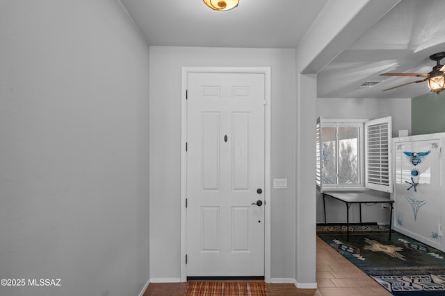 2108 W Moon Milk St, Benson, AZ 85602 - entrance foyer featuring a ceiling fan, wood finished floors, and baseboards