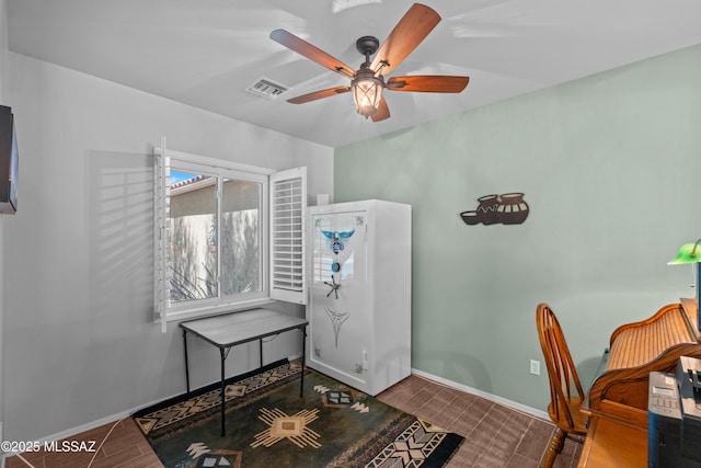 2108 W Moon Milk St, Benson, AZ 85602 - office area featuring ceiling fan and baseboards