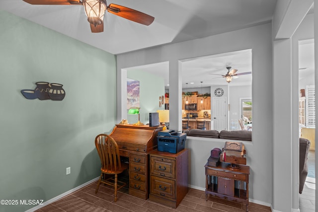 2108 W Moon Milk St, Benson, AZ 85602 - office with ceiling fan, baseboards, and wood finished floors