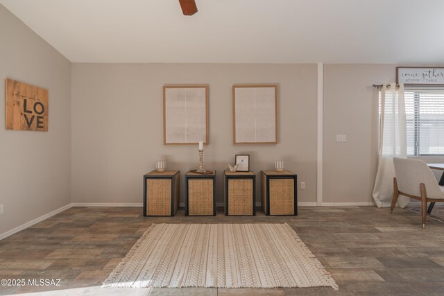 9536 N Scarlet Tanager Ln, Tucson, AZ 85742 - empty room featuring wood finished floors, baseboards, and a ceiling fan