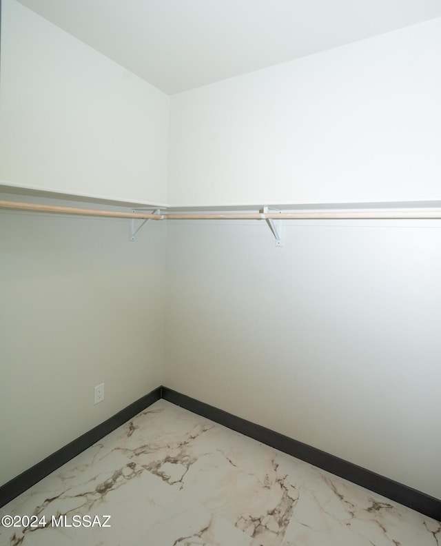 1920 W Pueblo Vista Blvd, Tucson, AZ 85713 - walk in closet featuring light marble finish floors