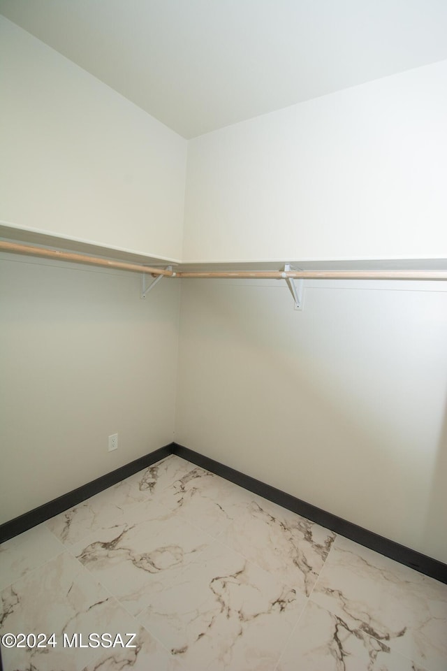 1920 W Pueblo Vista Blvd, Tucson, AZ 85713 - walk in closet with light marble finish floors